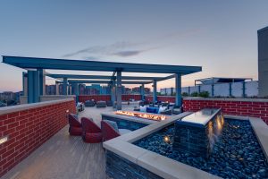 Relax by our custom water feature. 